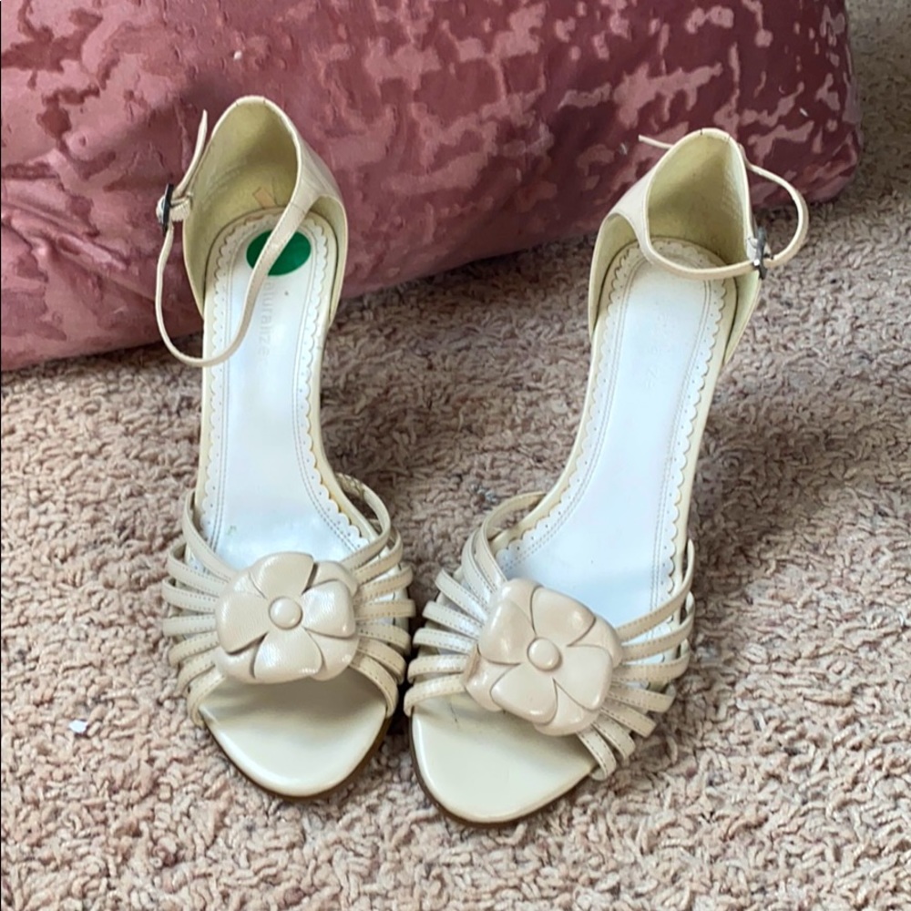Cream high-heeled shoes